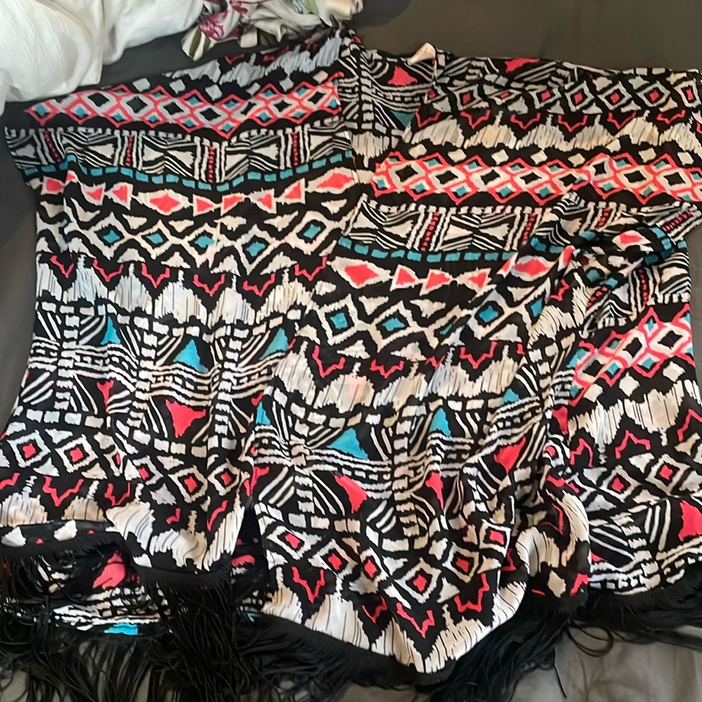 Elegant women’s Kimono top perfect for any occasion.